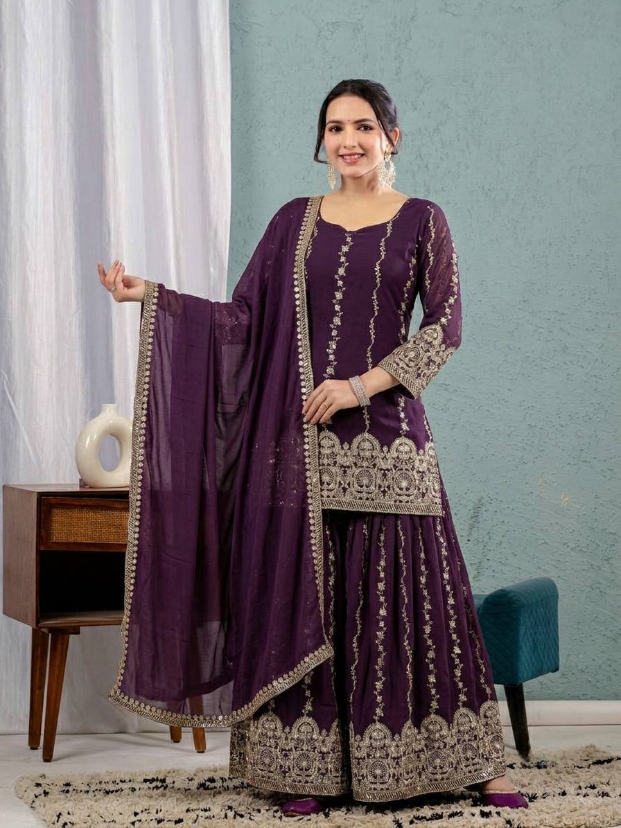 Exquisite Deep Wine Sharara Suit Set Embellished with Intricate Silver Zari Embroidery, Vertical Floral Motifs, and an Ornate Heritage Border